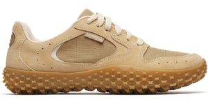 A tan sneaker with light beige laces and a tan, textured sole.