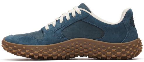 Blue shoe with brown sole and white laces.
