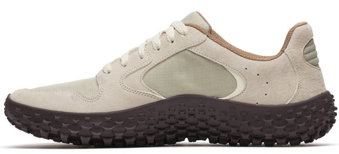 A beige athletic shoe with a thick brown sole.