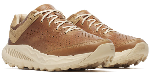 Pair of brown leather walking shoes with beige soles and laces.