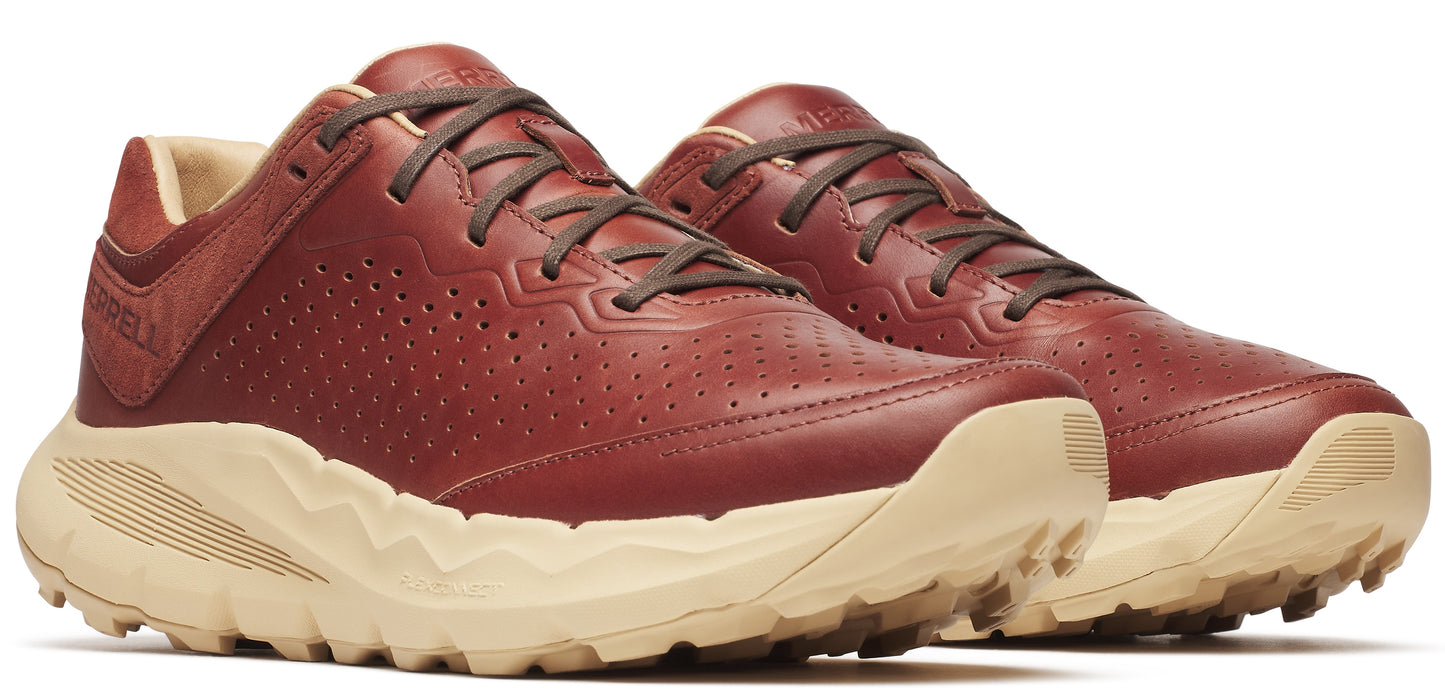 A pair of red leather sneakers with brown laces and tan soles.