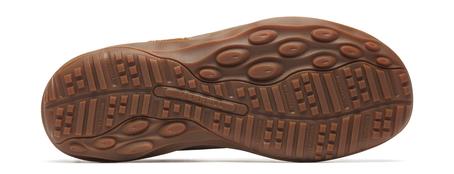 Brown shoe sole with circular and line tread patterns.
