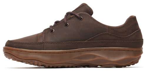 A dark brown leather shoe with dark brown laces and a ridged brown sole.