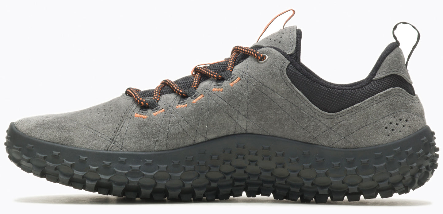 A grey athletic shoe with a patterned sole and orange laces.
