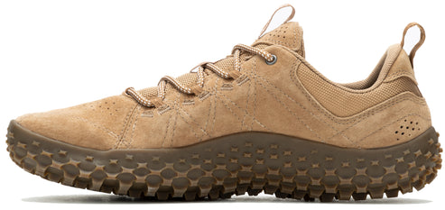 A tan colored athletic shoe with a textured sole and lace-up closure.