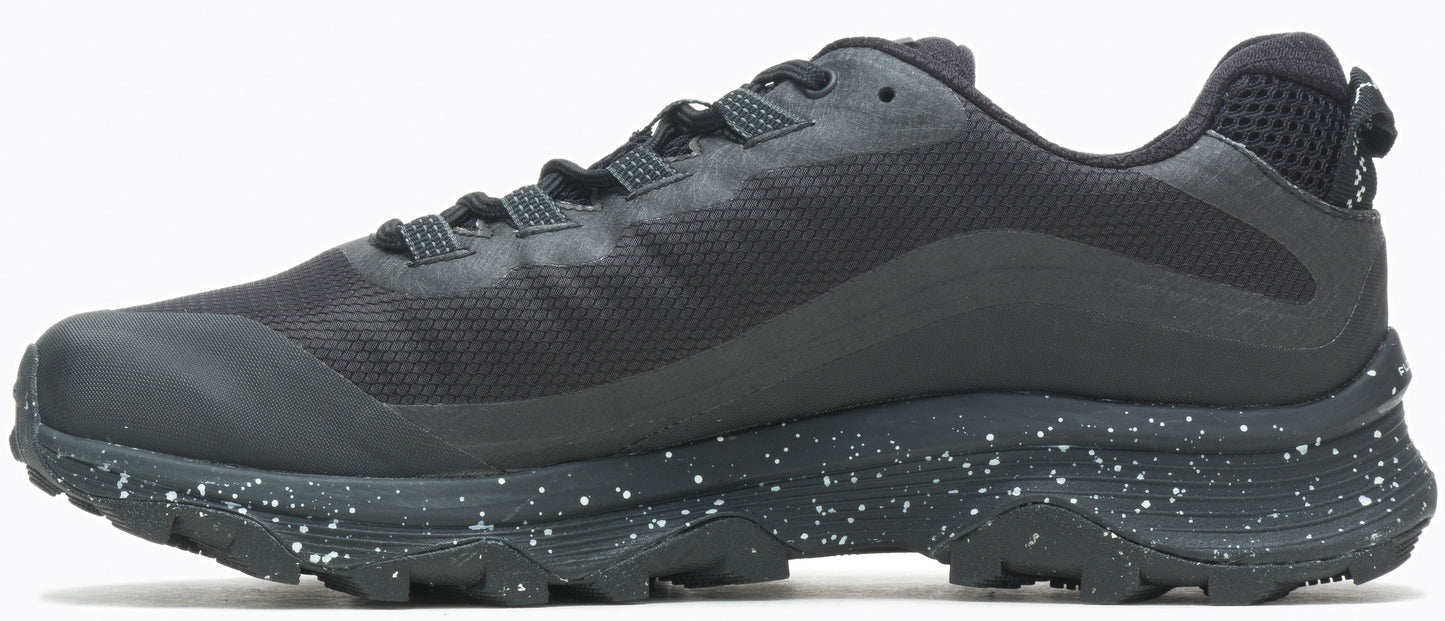Black running shoe with white speckled sole.
