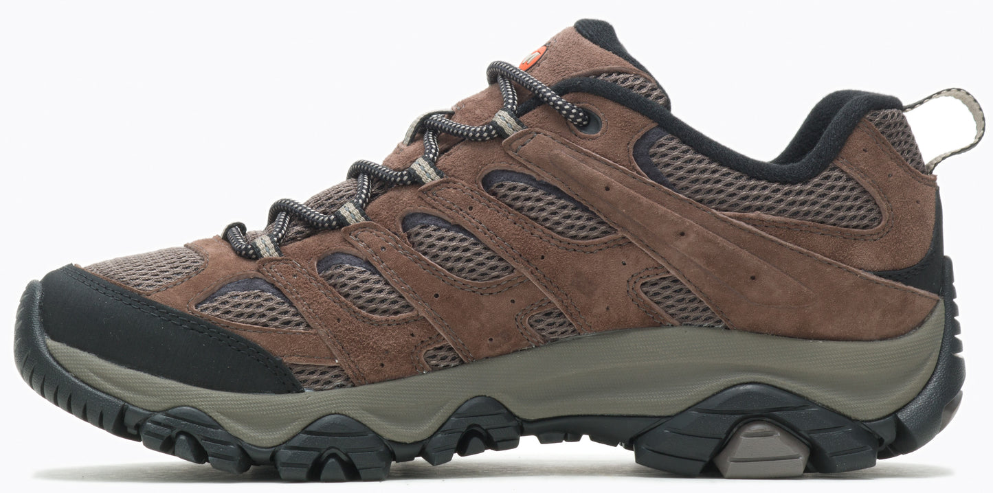 A brown hiking shoe with a black sole and laces.