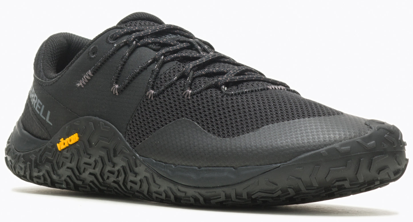 A black athletic shoe with dark laces and a yellow logo.