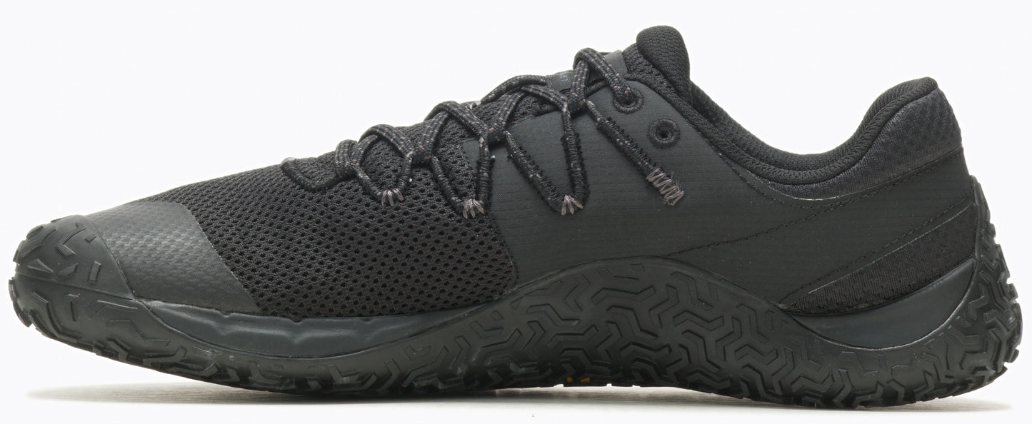 A black sneaker with a mesh upper and patterned sole.