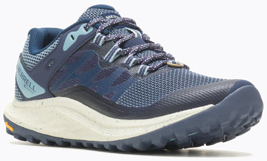 Blue hiking shoe with rope laces and thick, speckled white sole.