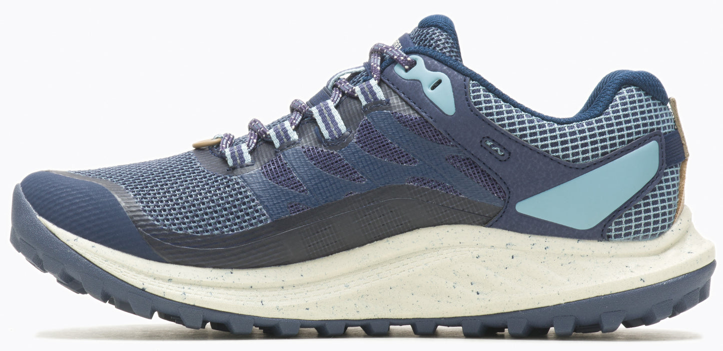 A navy-colored shoe with light gray accents and a speckled sole.