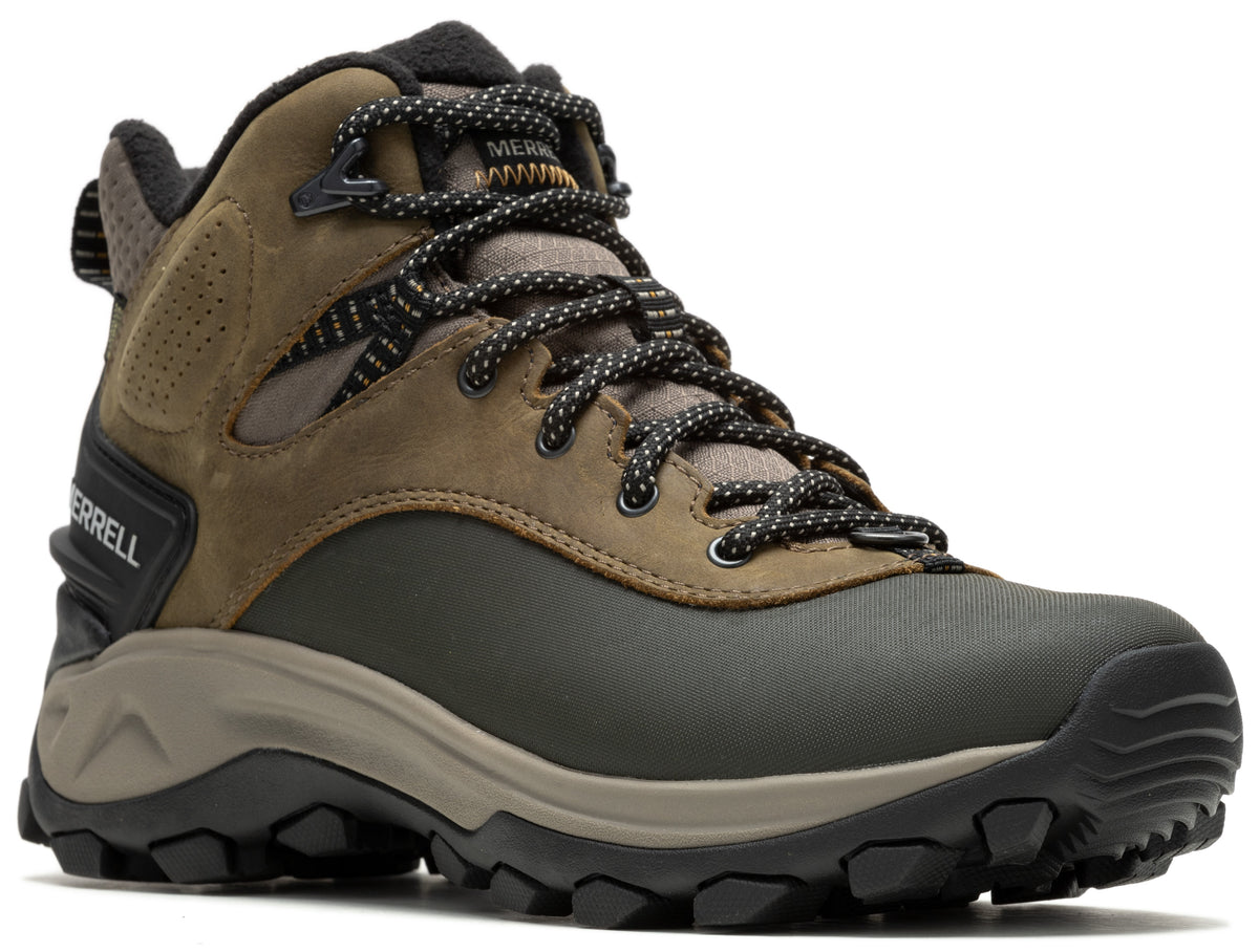 Hiking boot with dark green lower, brown upper, black outsole and black and gray laces.