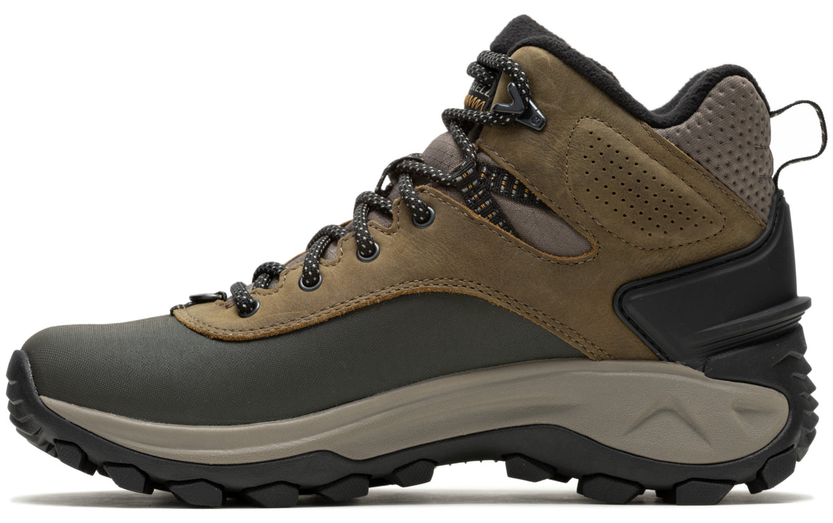 Hiking boot, high ankle, brown leather and green rubber upper, patterned laces, black outsole.