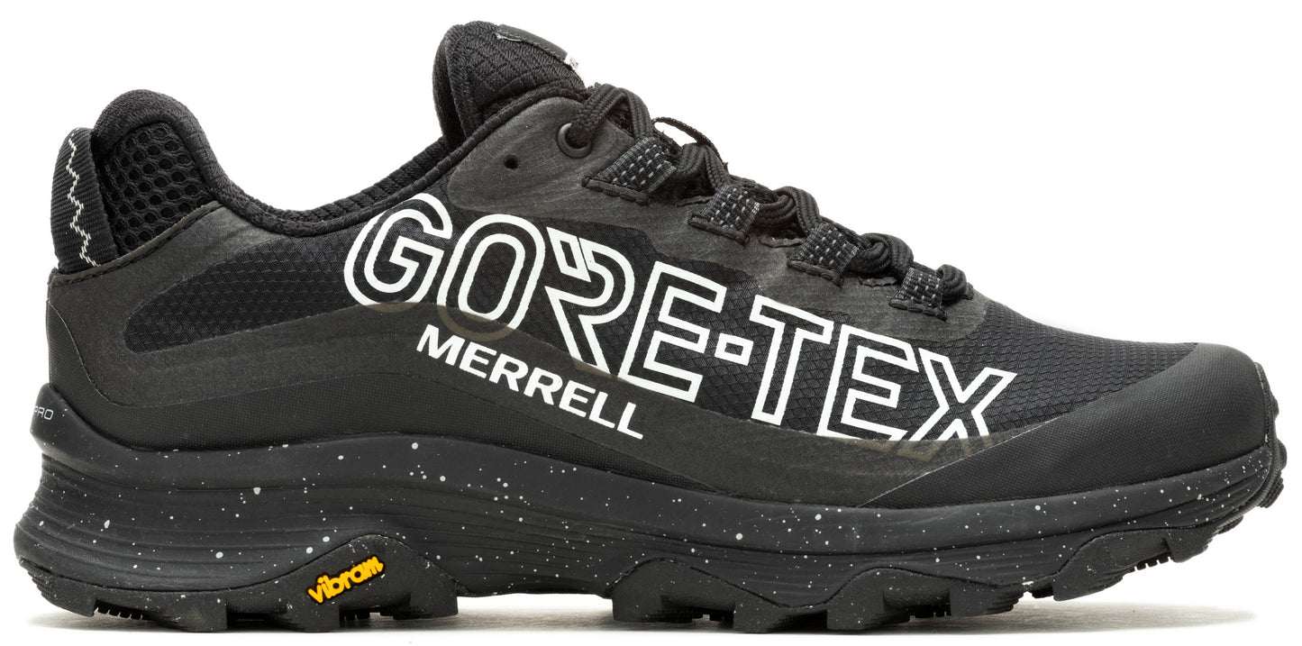A black athletic shoe with a thick, speckled sole, featuring 'GORE-TEX' and 'MERRELL' printed on the side.