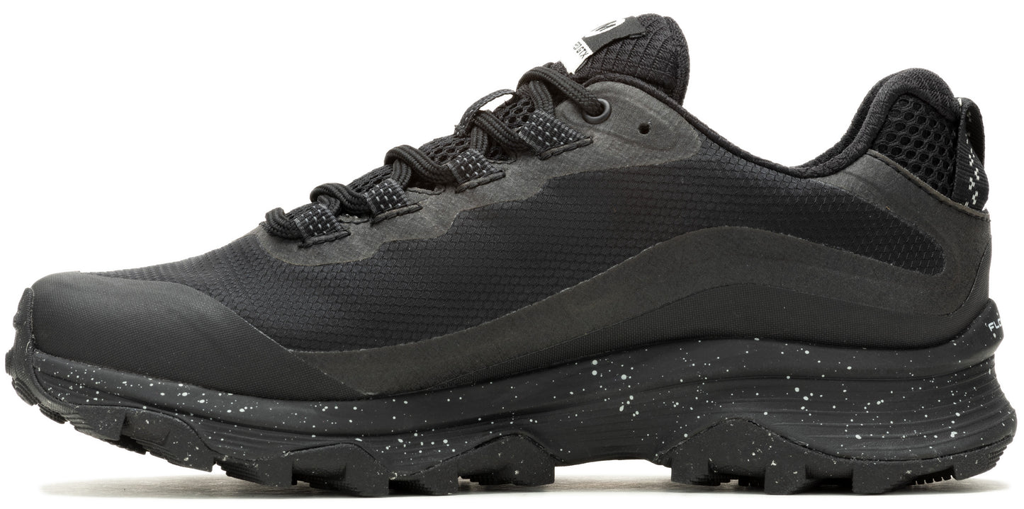 A black running shoe with a speckled sole.