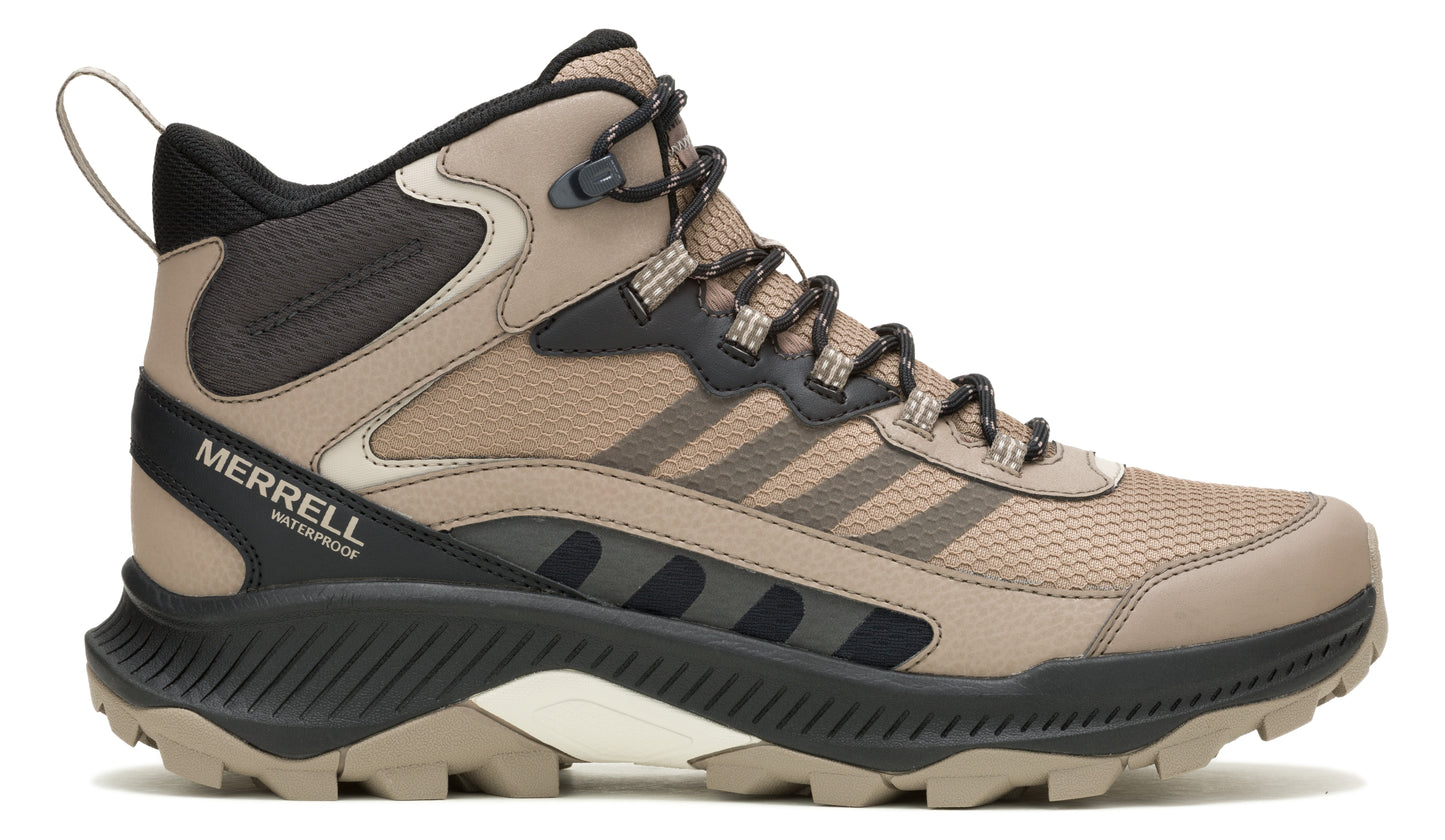 Tan and black high top hiking shoe with "MERRELL WATERPROOF" printed on the side.