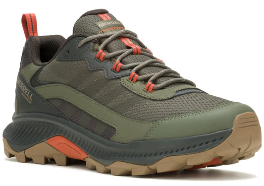 A green hiking shoe with orange accents and brown soles.