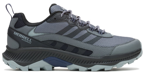 A gray hiking shoe with a black and gray sole.