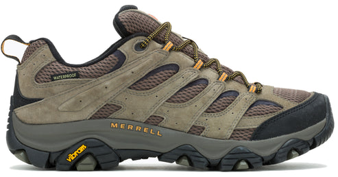 Side view of waterproof hiking shoe with Vibram sole, black toe, and tan laces.