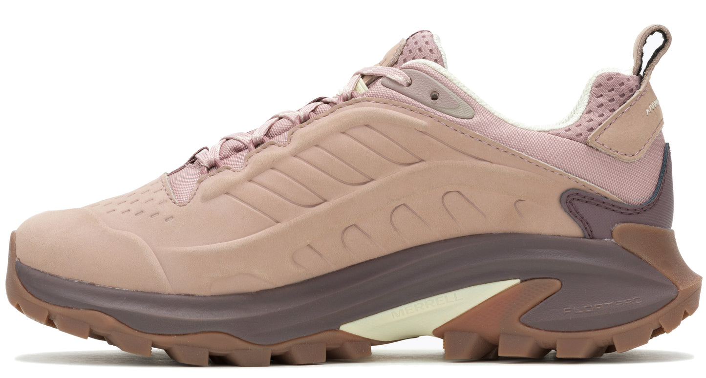 A low-rise running shoe in pink with brown soles and visible shoelaces.