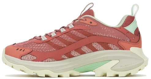 A pink athletic shoe with a thick, cream-colored sole.