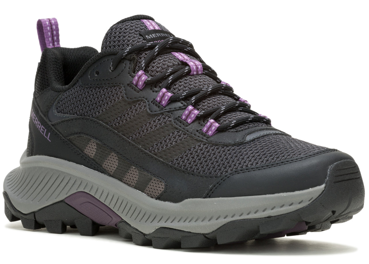 A dark gray athletic hiking shoe with purple accents and a thick gray sole.