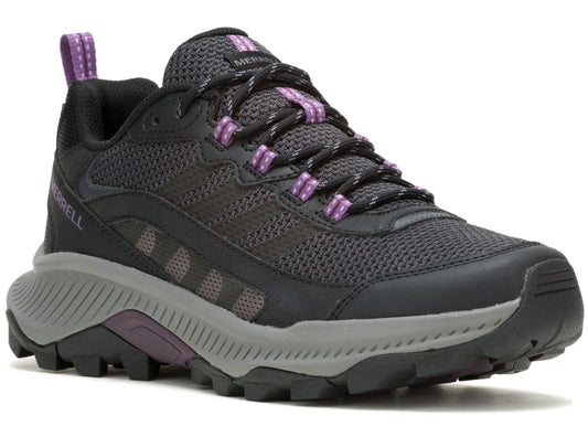 Black and gray hiking shoe with purple accents.