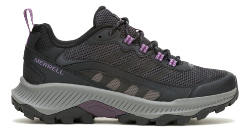 A black hiking shoe with gray sole and purple accents, showcasing a mesh upper and lugged outsole.