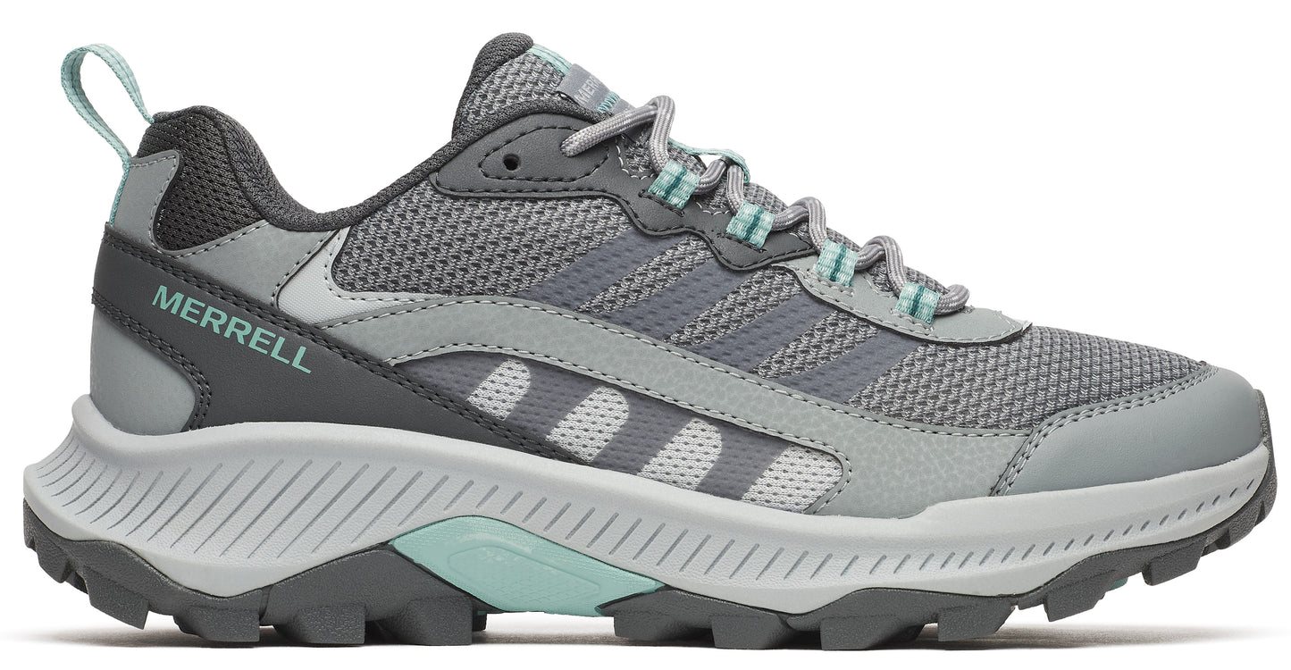 Gray athletic shoe with light blue accents and lug sole. "MERRELL" text near the heel.