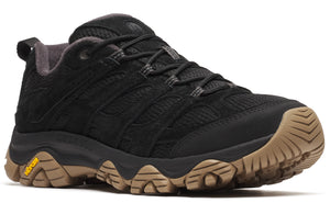 A black, low-rise hiking shoe with brown lug soles.