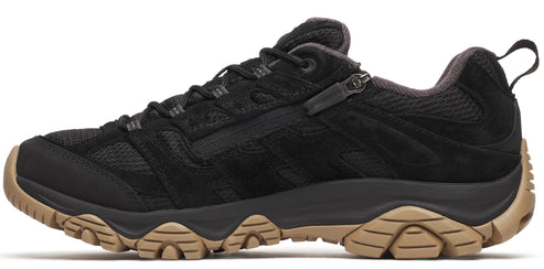 A black hiking shoe with a tan sole.