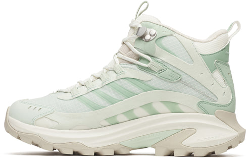 Side view of a light green and white hiking boot with a thick sole and lace-up closure.