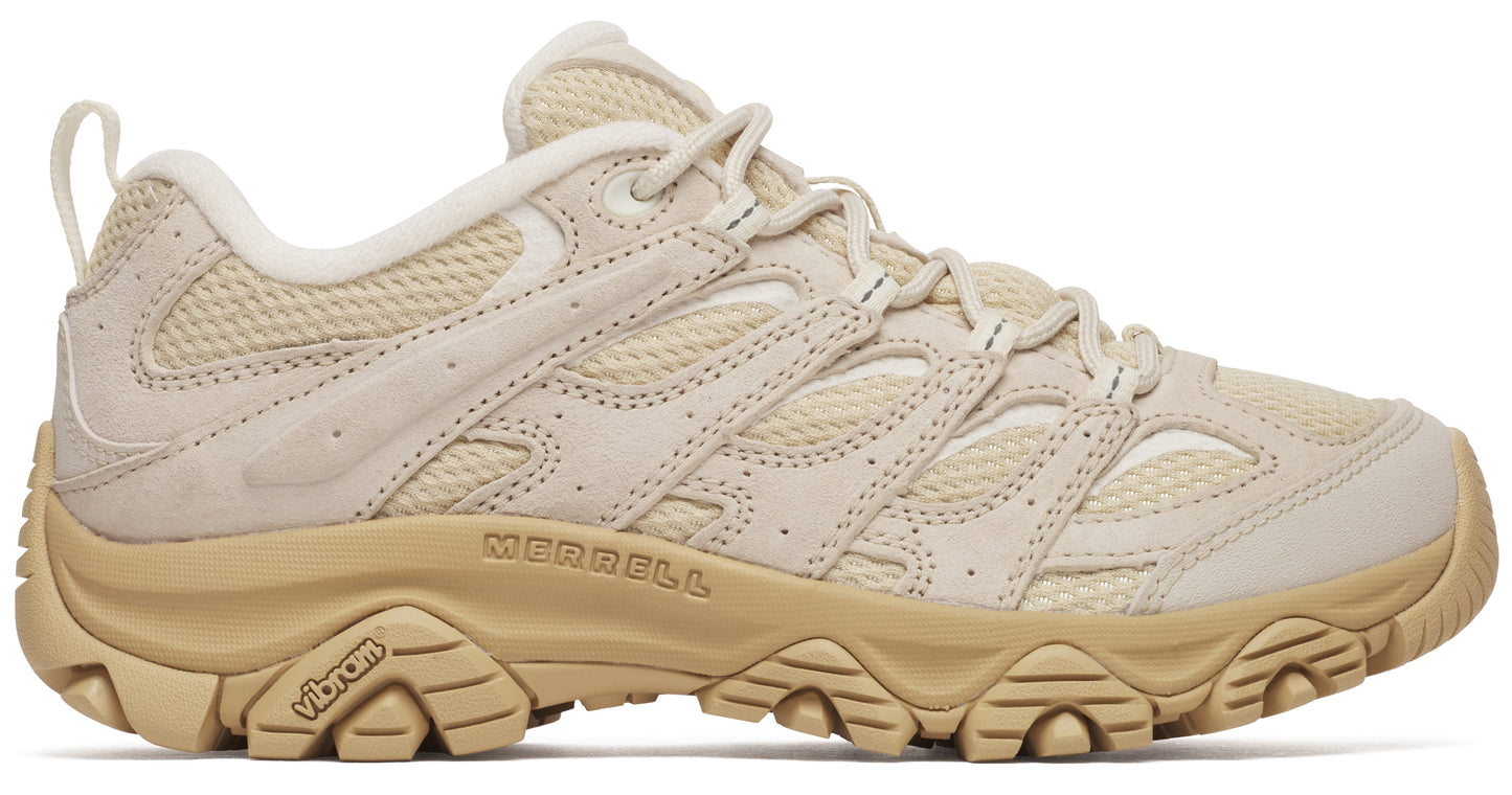 Beige hiking shoe with a lugged vibram sole, mesh upper, and pull-tab.