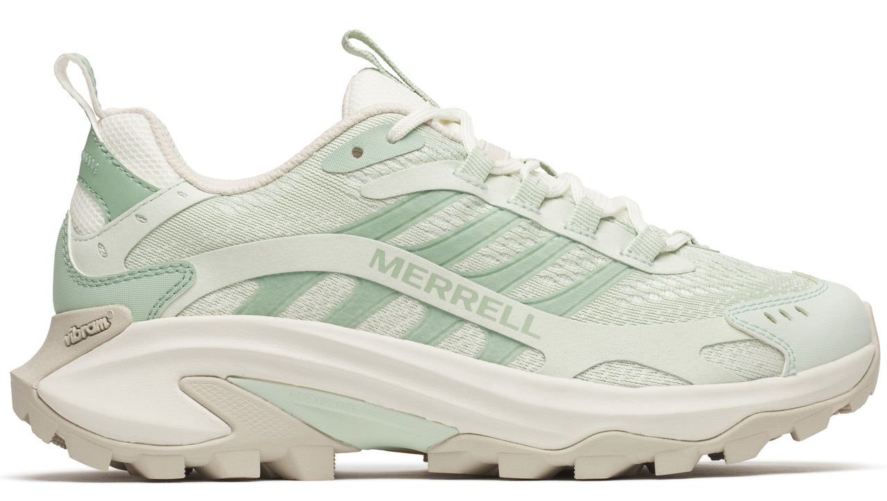 Off-white running shoe with light green stripes and Vibram sole.