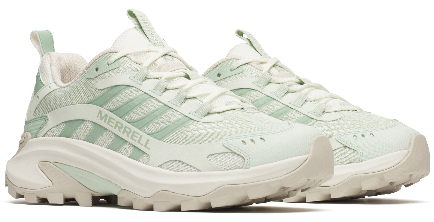 Two light green athletic sneakers with a white sole and the word "MERRELL" printed on the side.