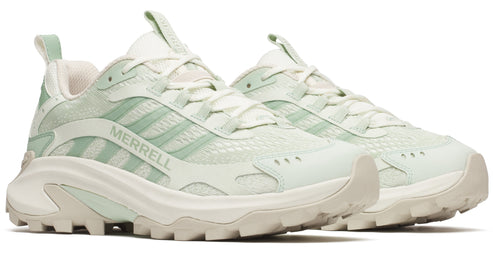 Two light green athletic sneakers with a white sole and the word "MERRELL" printed on the side.
