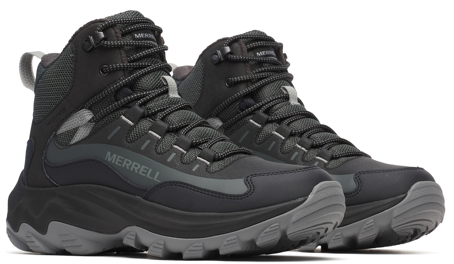 Pair of black hiking boots with gray soles and accents featuring the word MERRELL