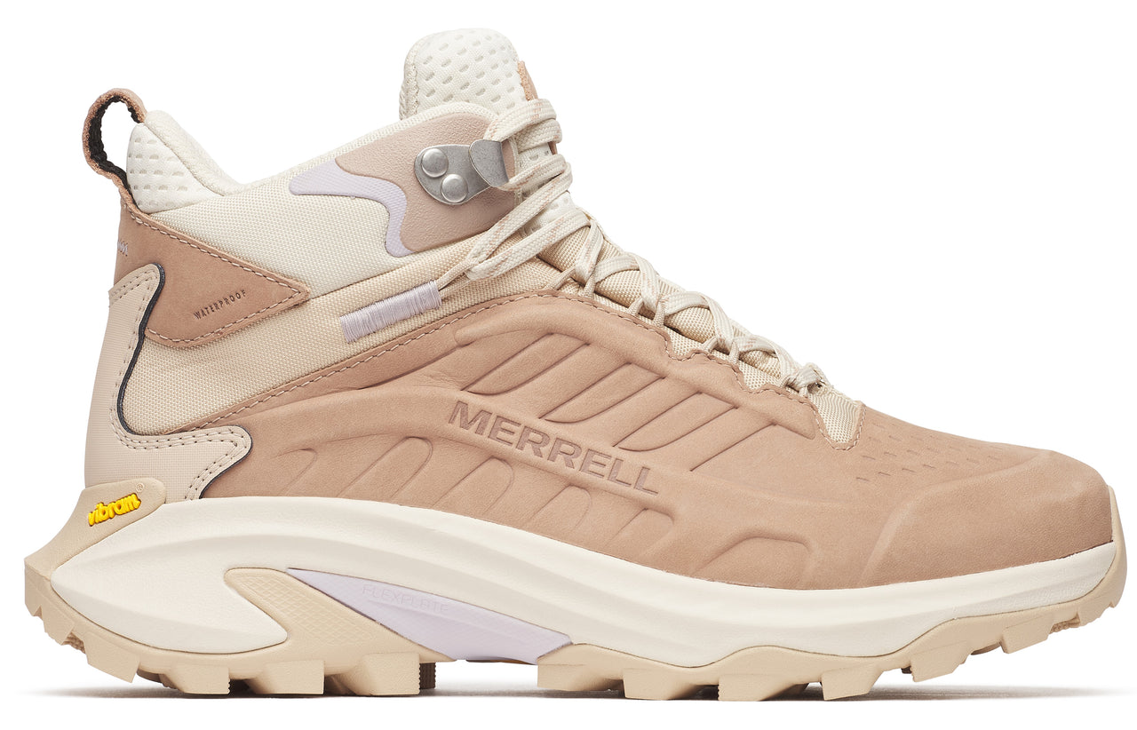 Beige hiking boot with the word "MERRELL" in beige letters and cream colored soles.