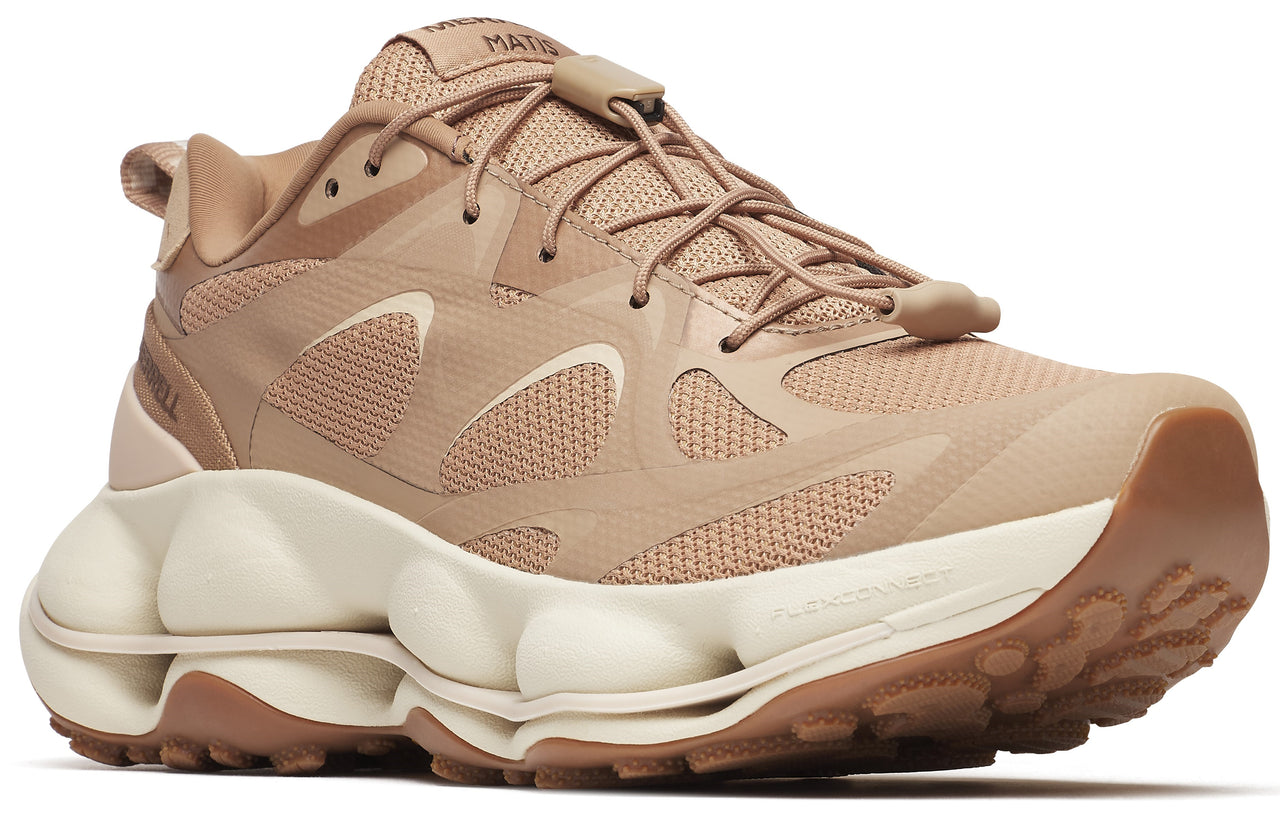 Tan athletic shoe with a toggle lace, mesh upper, and bulbous sole.
