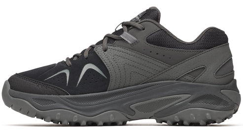 Low-top athletic shoe with a gray treaded sole and dark gray laces and upper.