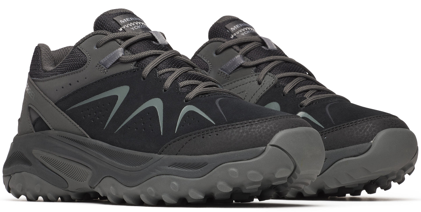 A pair of black and gray low-top trail running shoes with gray laces.
