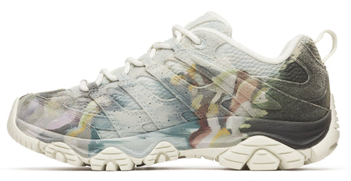 Low-top athletic shoe with white laces and a patterned white and gray upper and midsole.