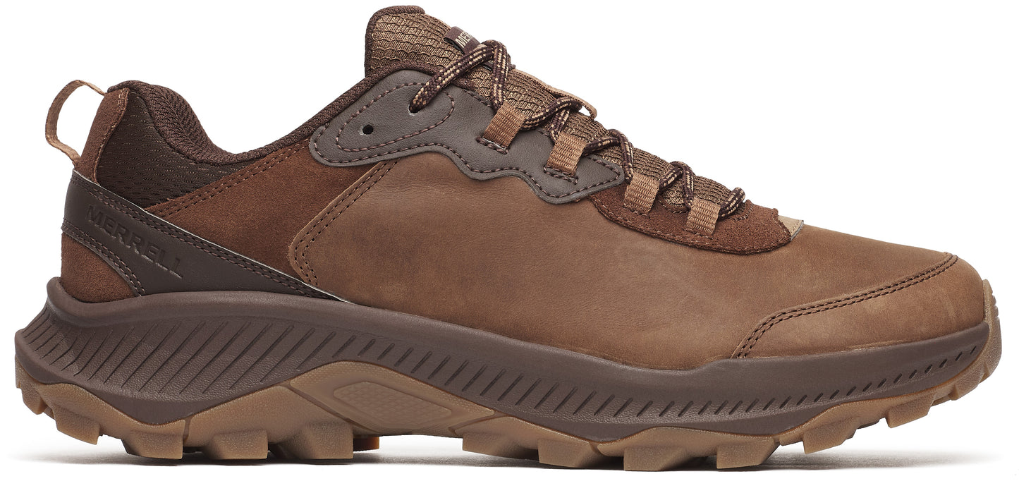 A brown leather hiking shoe with a lug sole.