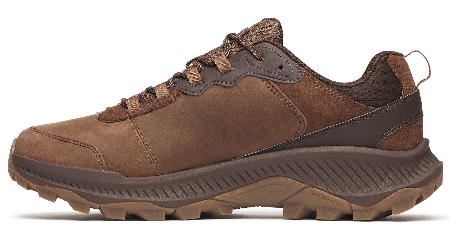 A brown leather trail running shoe with lug sole and a pull-tab at the heel.