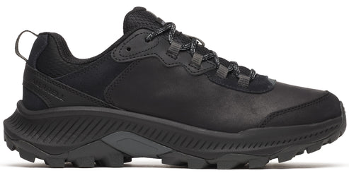 A black trail running shoe with a low profile and a lugged outsole.