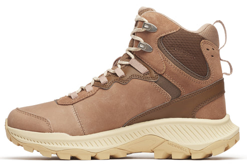Tan hiking boot with metal eyelets, laces, a high ankle cuff, and a lugged sole.