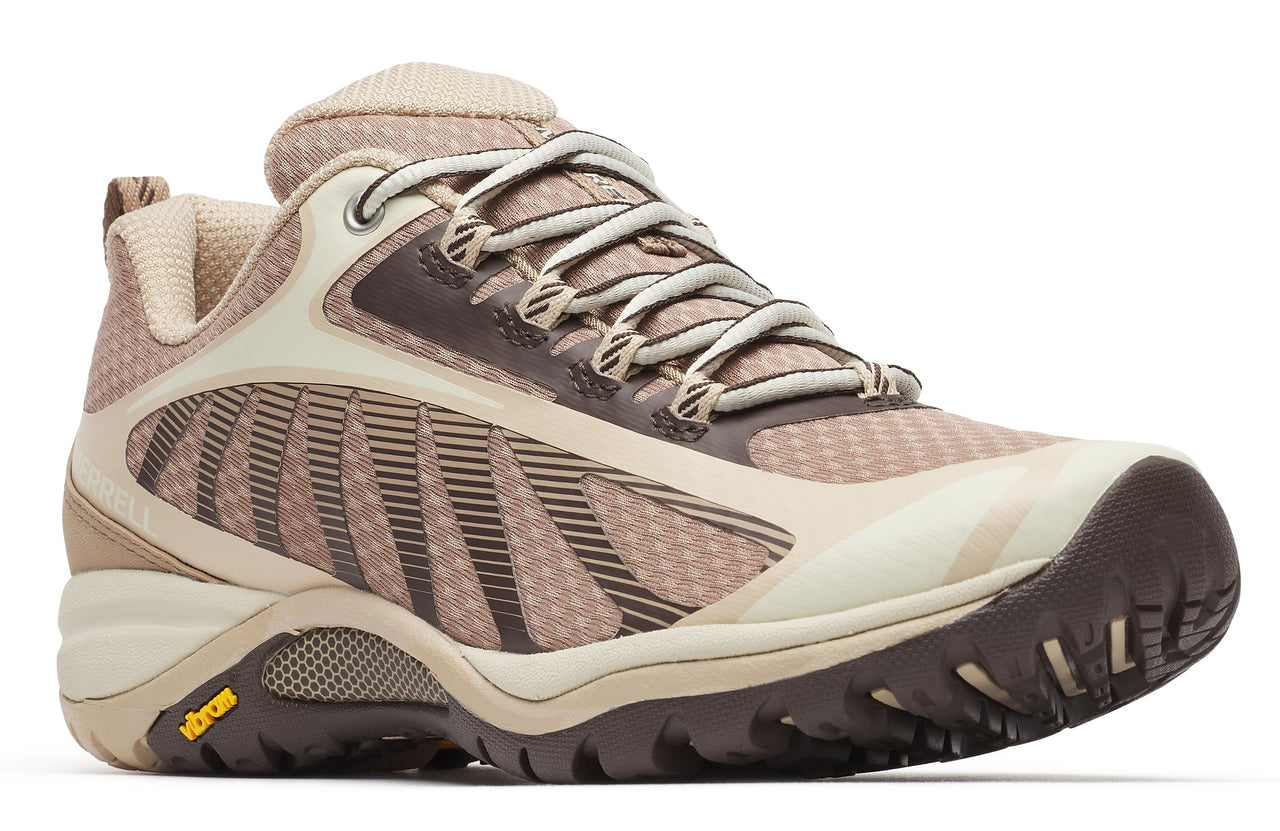 Tan hiking shoe with brown accents and lug sole.