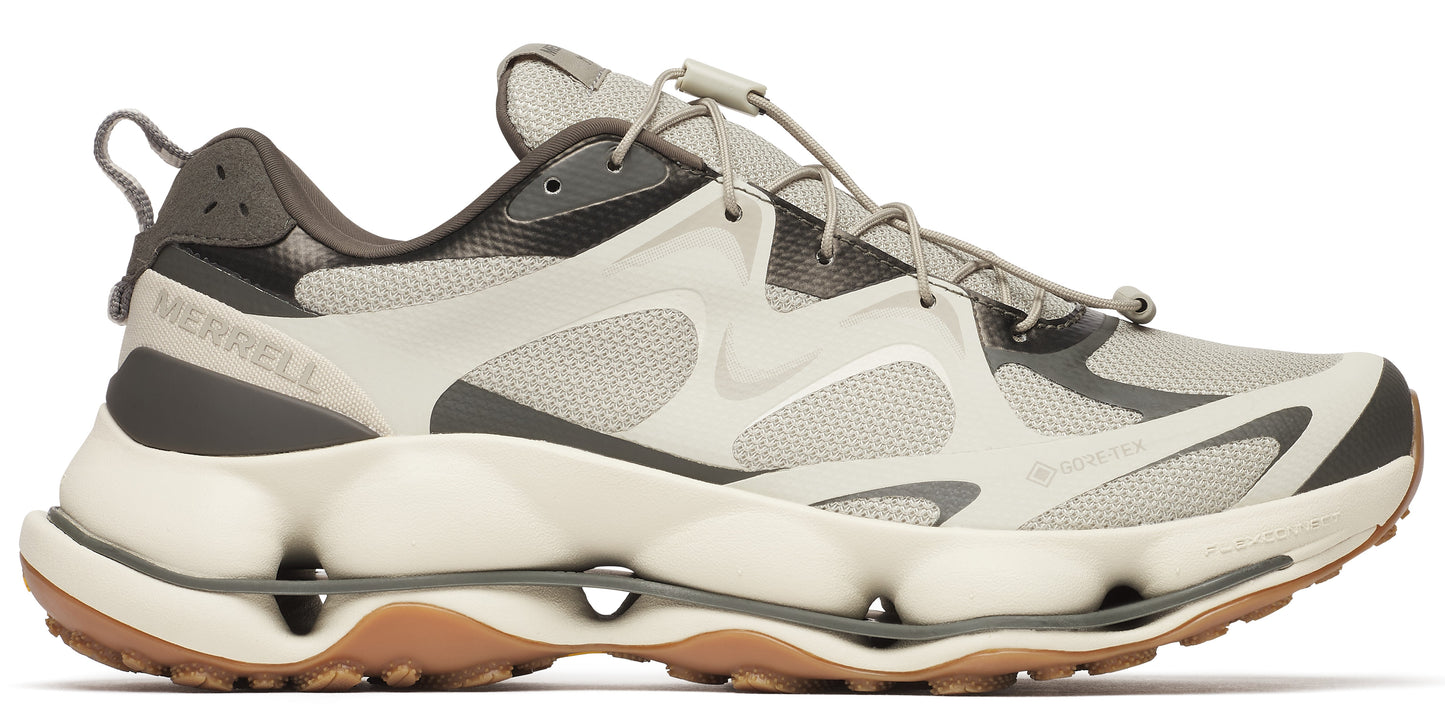 A hiking shoe with a taupe upper, brown trim, and a bulky white sole with cutouts.