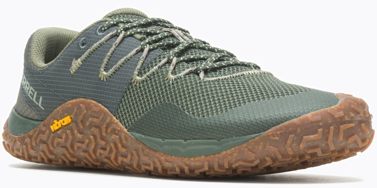 A green athletic shoe with brown sole and laces.