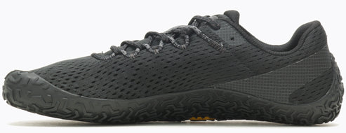 A black athletic shoe with a low profile and a patterned sole.